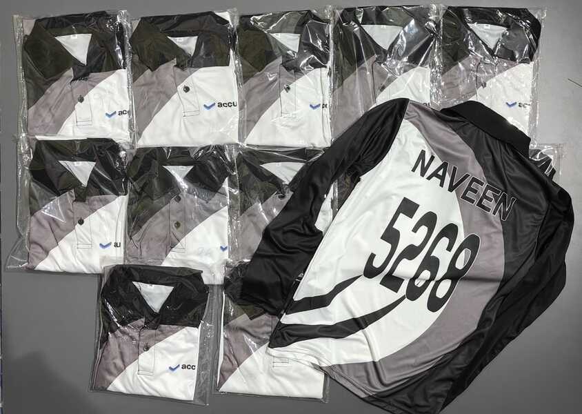 stack of custom sports jerseys with one customized on top showing player name and number.