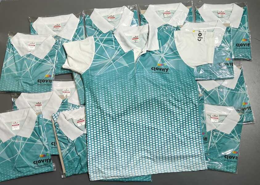 lots of custom sports jerseys, with one customized jersey on top showing the front logo of clovity company.